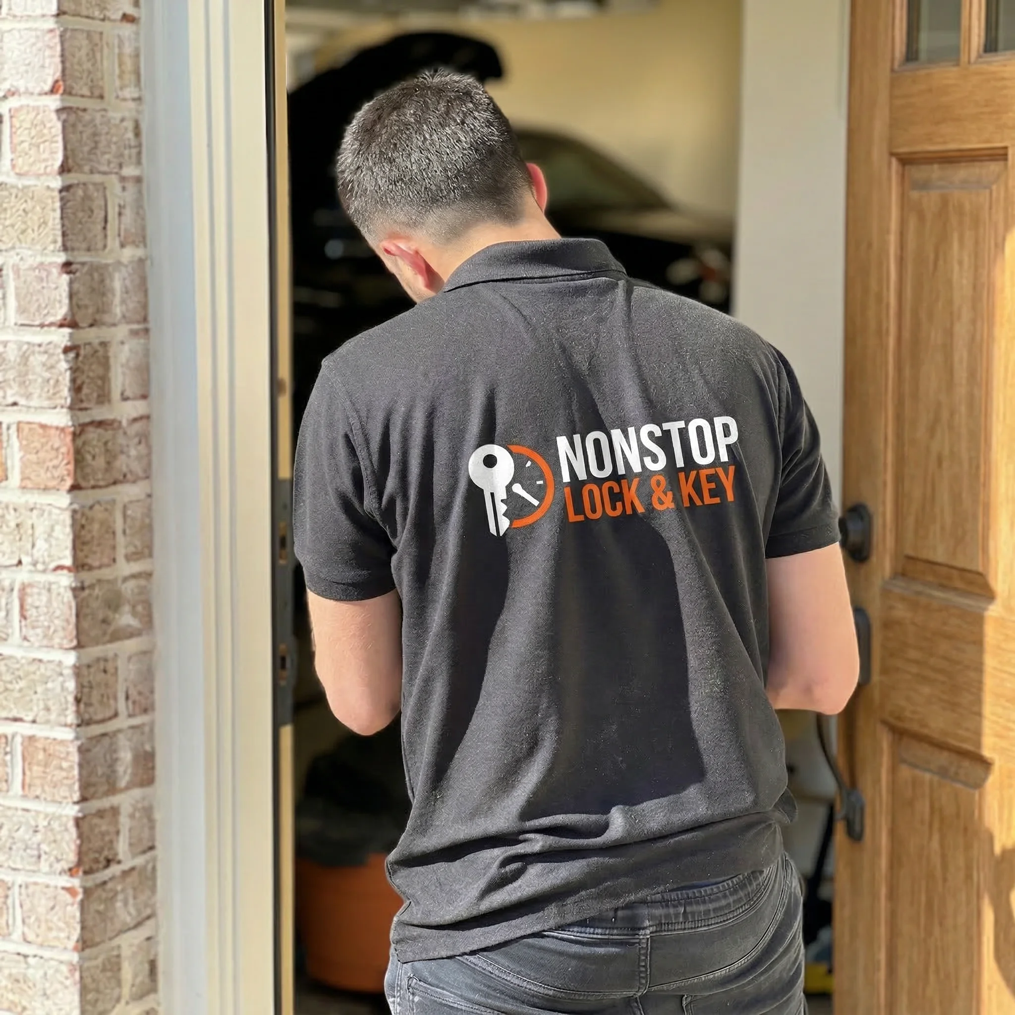 Nonstop Lock & Key locksmith technician rekeying a lock in St. Louis, MO